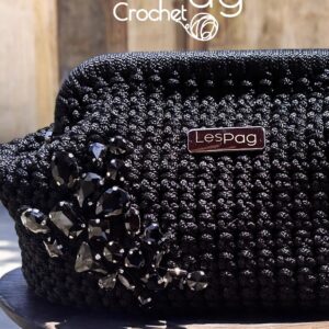 ISA CLUTCH borsa a mano e a tracolla in fettuccia di polipropilene.